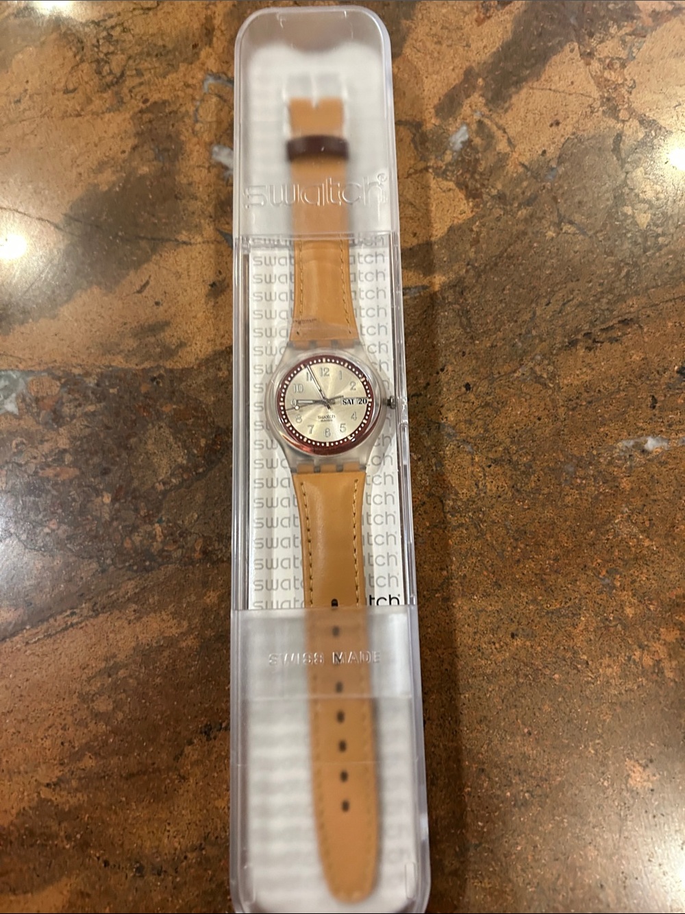 Swatch Tan Strap Watch with Cream Dial and Red Accent Bezel